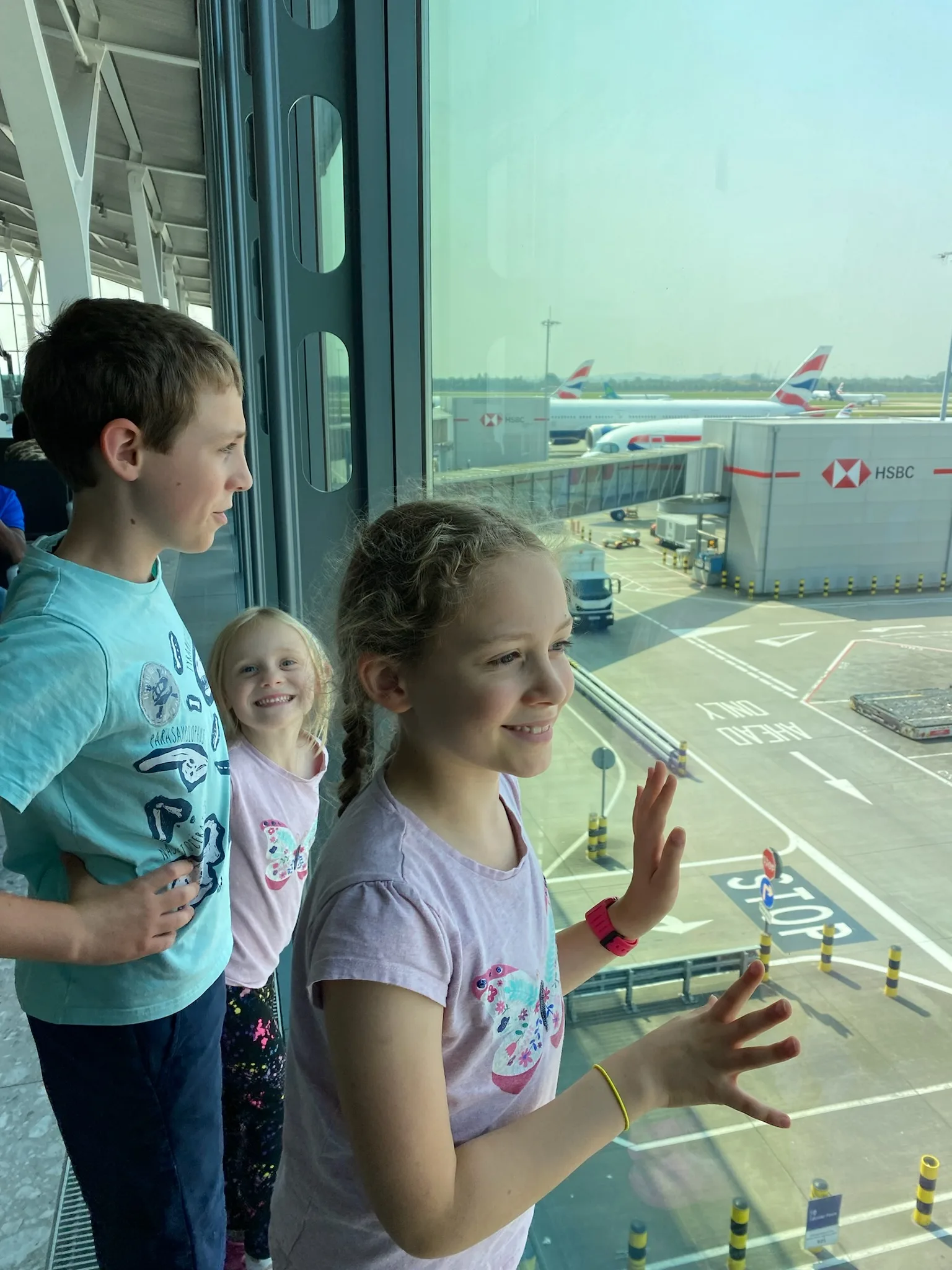 Kids getting excited for the first time on a plane