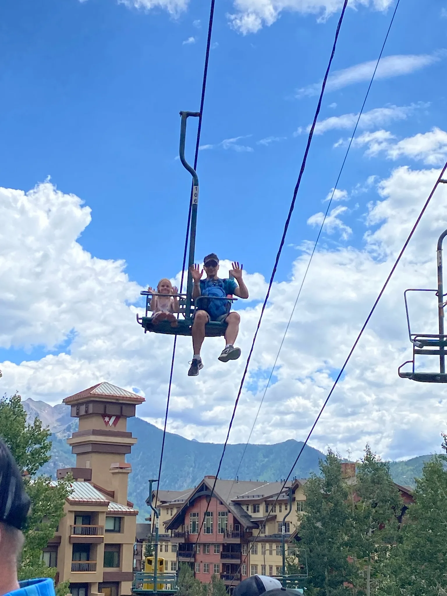 Heading up the chair lift for the toboggan run