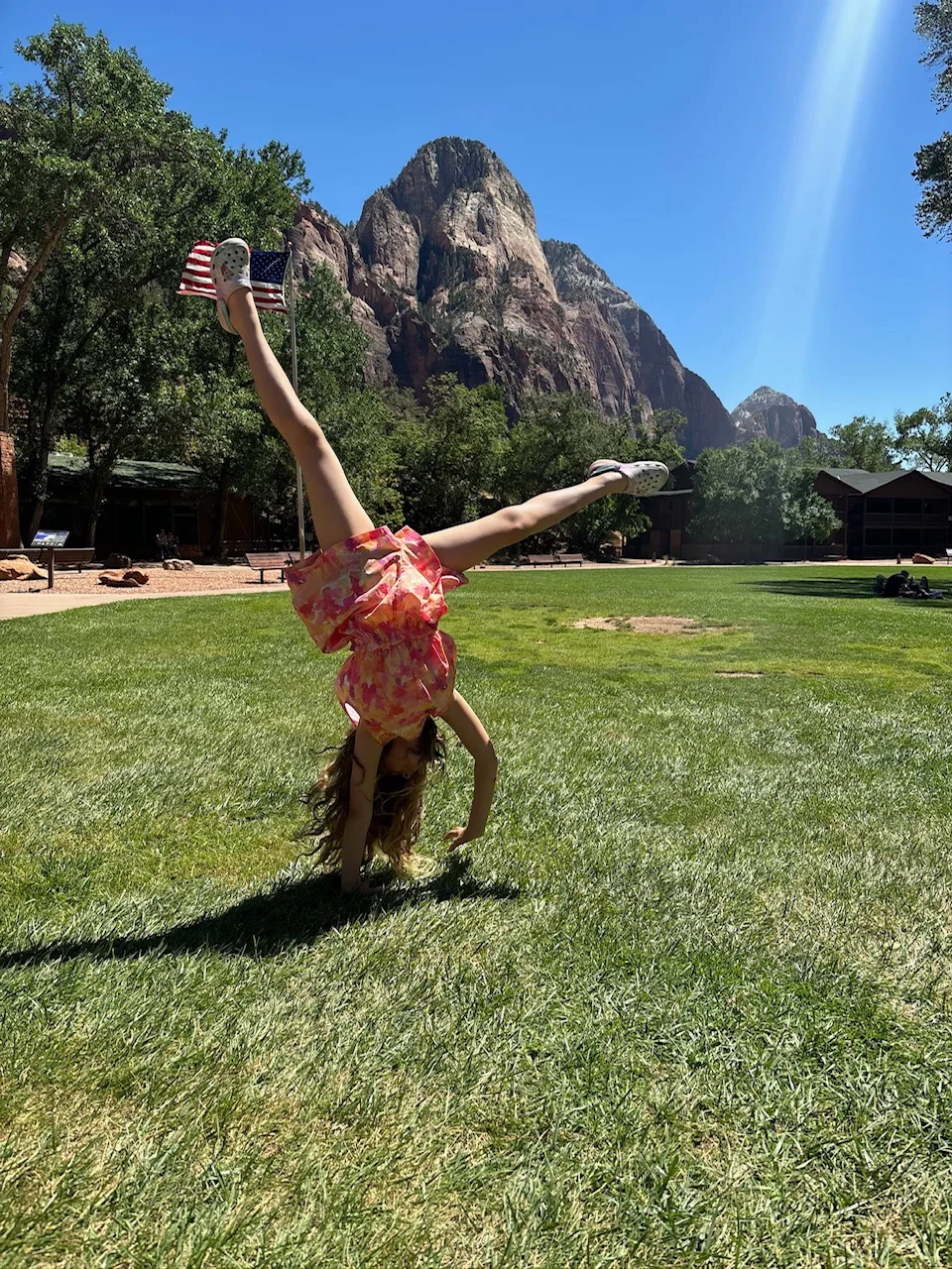 More cartwheels, this time on the lawn at Zion Lodge
